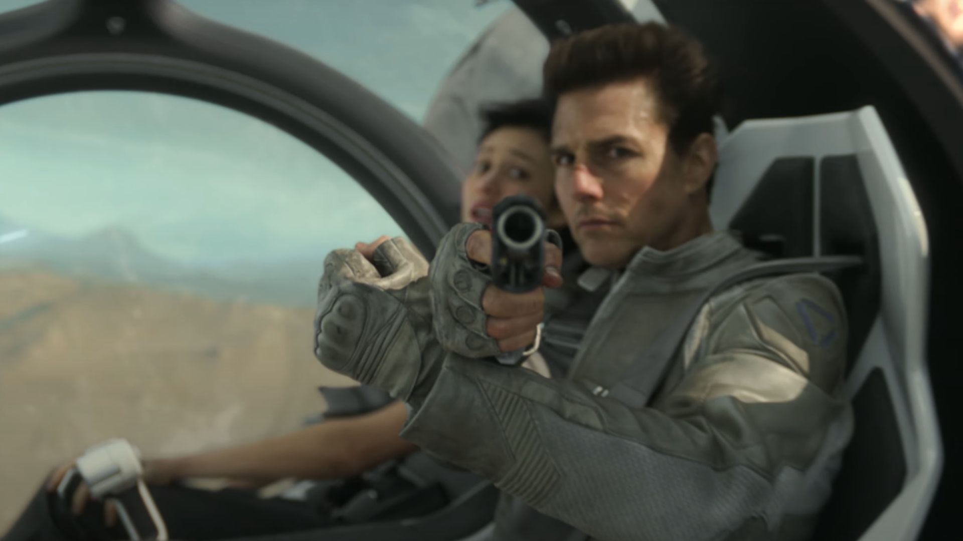Jack points at the screen while Julia watches in horror