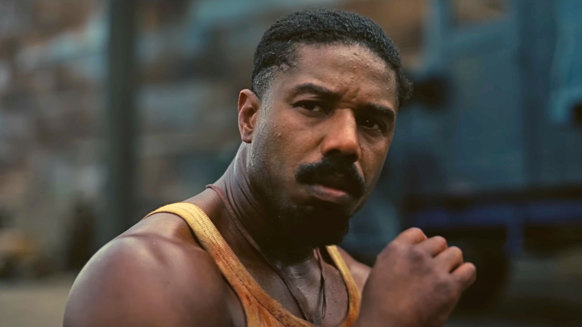 Michael B. Jordan as Smoke (Image via YouTube/Warner Bros.)