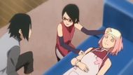 Sasuke returns, Sakura faints, and Sarada tends (Image Source: Studio Pierrot)