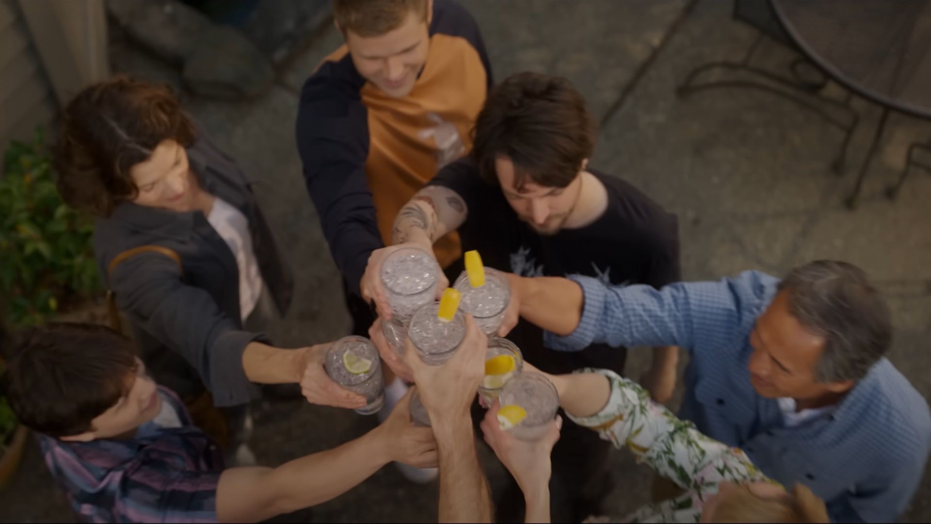 People doing a cheers, as seen from an ariel view