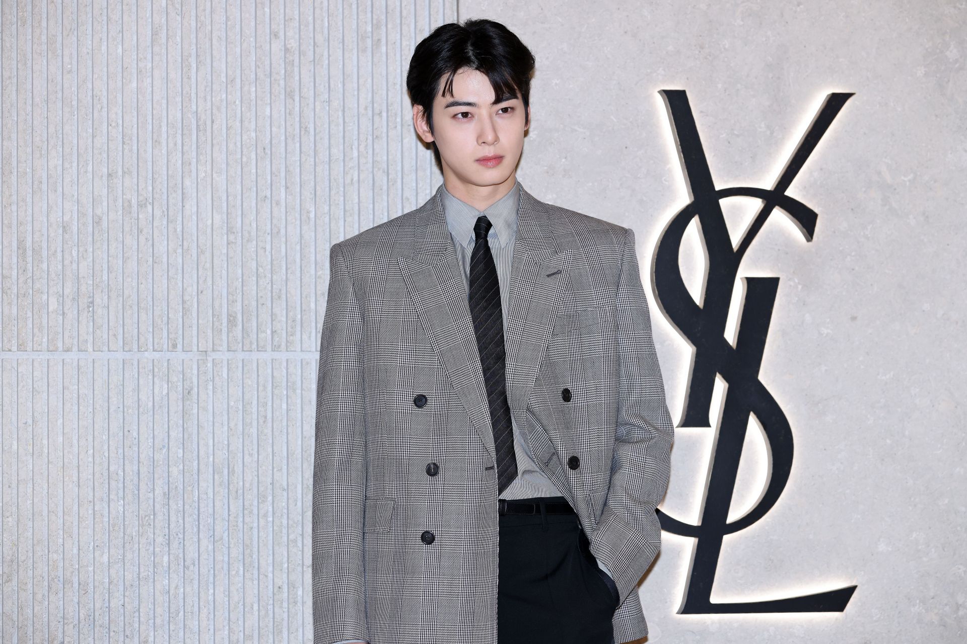 Actor Cha Eun-Woo poses for a photocall for &quot;Saint Laurent&quot; renewal opening at Shinsegae Department Store on March 31, 2025 in Seoul, South Korea (Jinu was partially inspired in him) | Image via: Getty