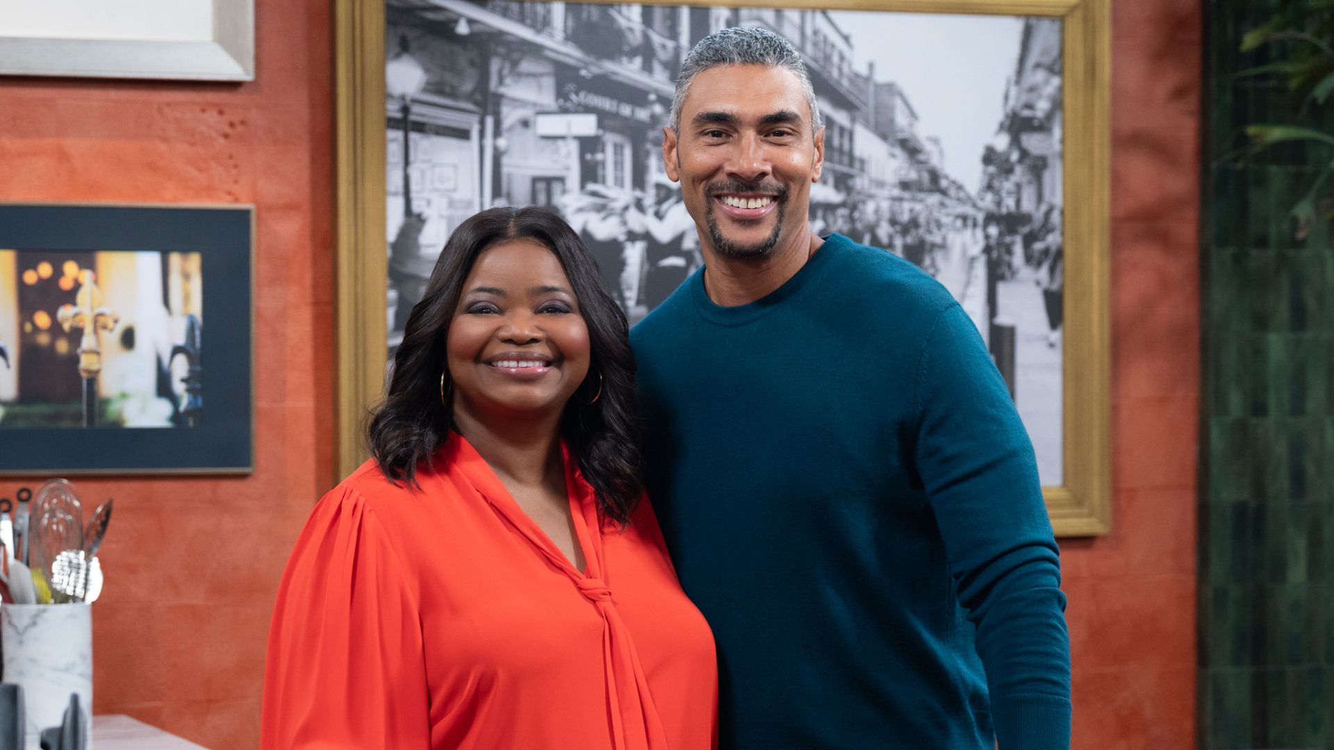 Family Recipe Showdown host Octavia Spencer and Edgar Chase (image via Food Network)