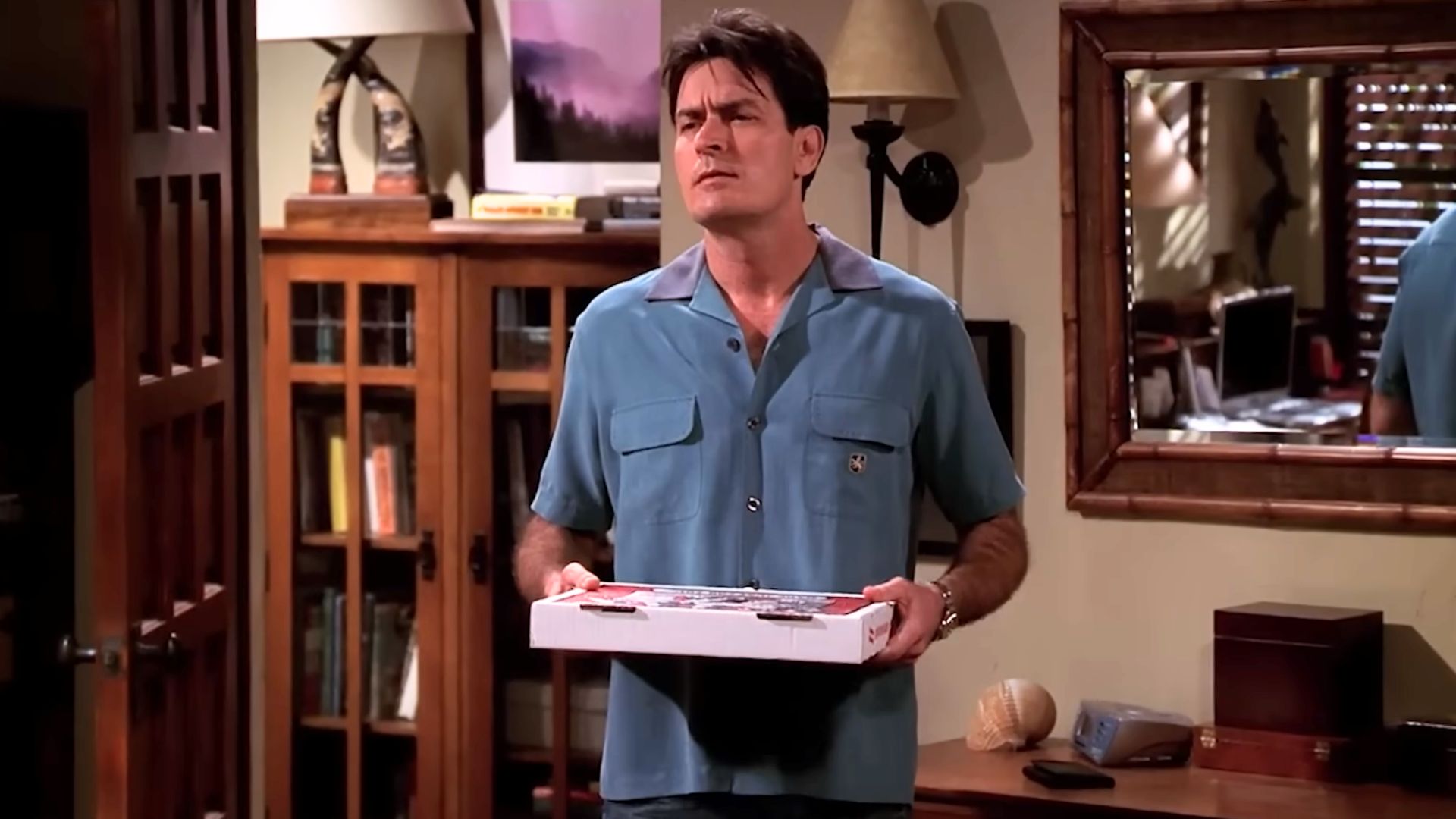 Charlie Sheen in Two and a Half Men | Image via Warner Bros. Television