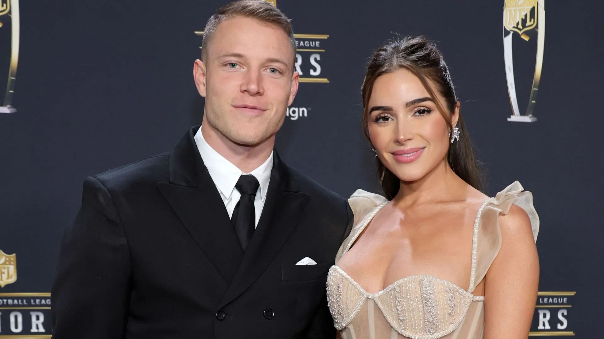 Christian McCaffrey and Olivia Culpo