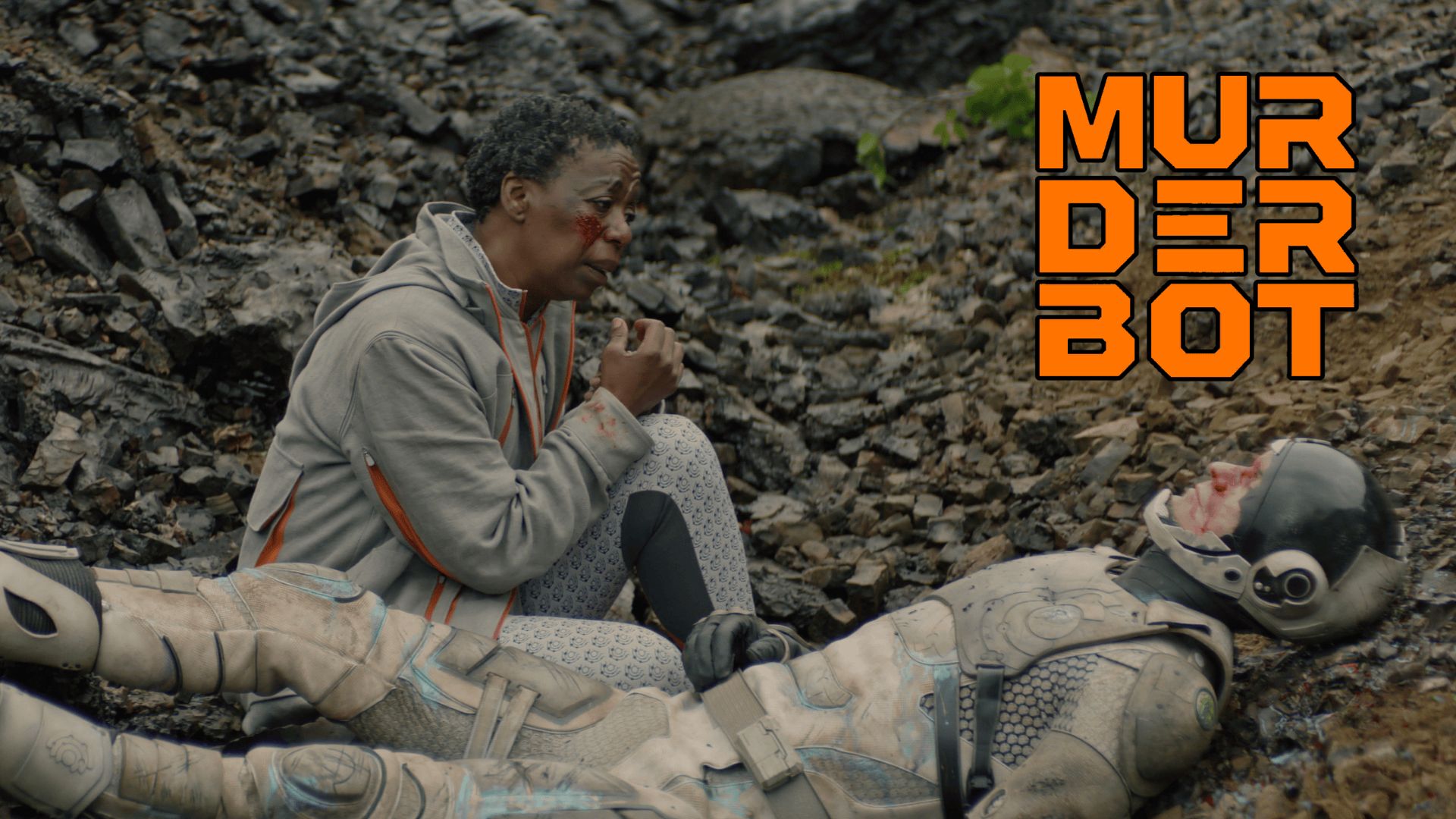 Noma Dumezweni and Alexander Skarsg&aring;rd in &quot;Murderbot,&quot; now streaming on Apple TV+ | Image via: Apple TV+