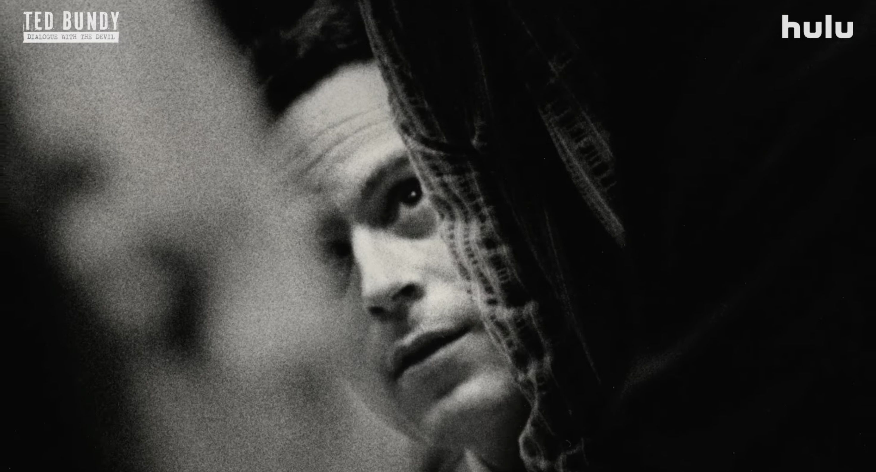Over thirty years since his death, Ted Bundy continues to be a name that holds the public in a vice-like grip of horror and fascination. (Image source- Hulu/YouTube) 