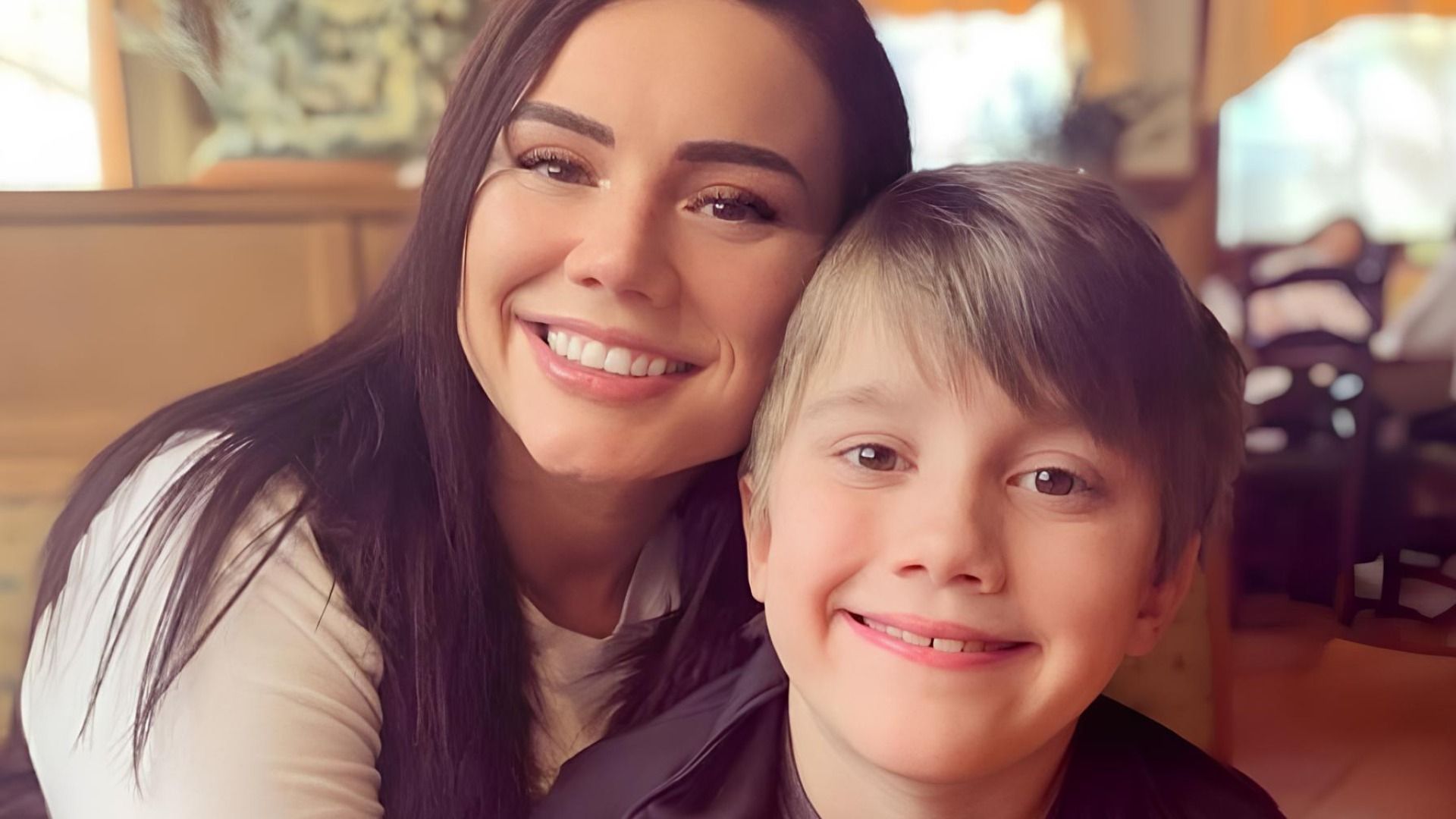 Whitney Purvis poses for a photo with son (Image via Instagram)