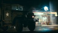 The truck and the gas station moments before the explosion. (Image via Carolco Pictures)