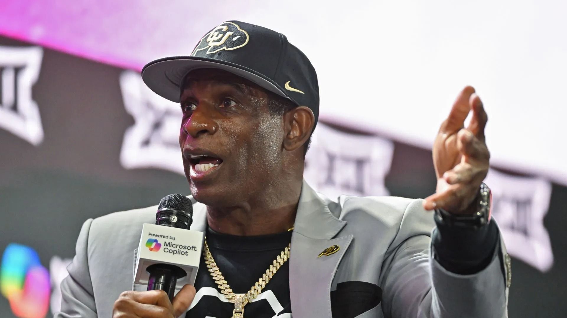 Deion Sanders talks during a coaches roundtable during day two of Big 12 Media Days - Source: Getty