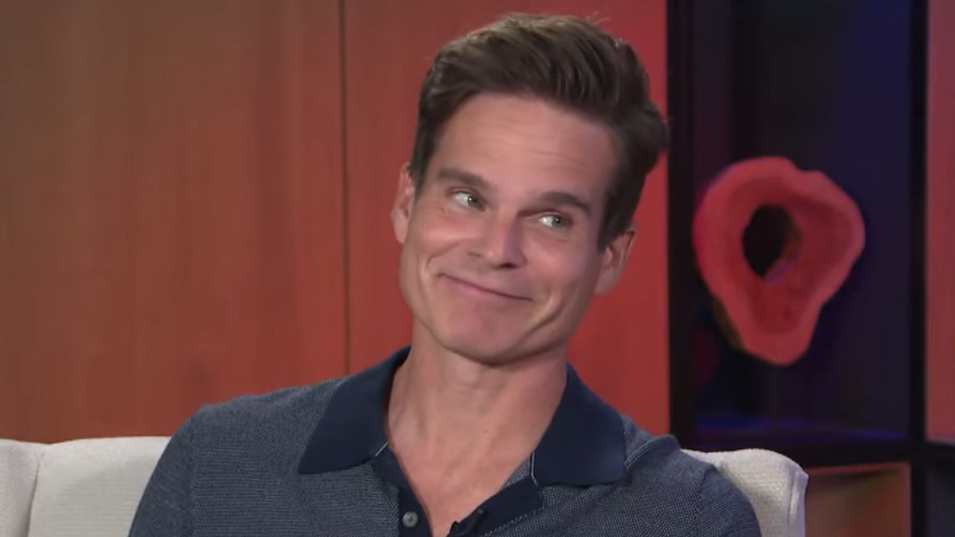 Greg Rikaart (Days of our Lives) cohosts Soapy with Rebecca Budig (The Bold and the Beautiful) | Image: YouTube