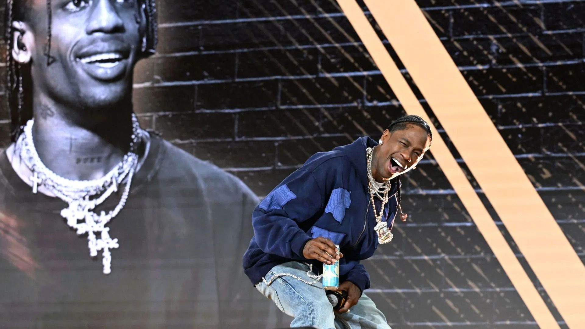 Travis Scott performs onstage at Fanatics Fest NYC 2025 - Source: Getty