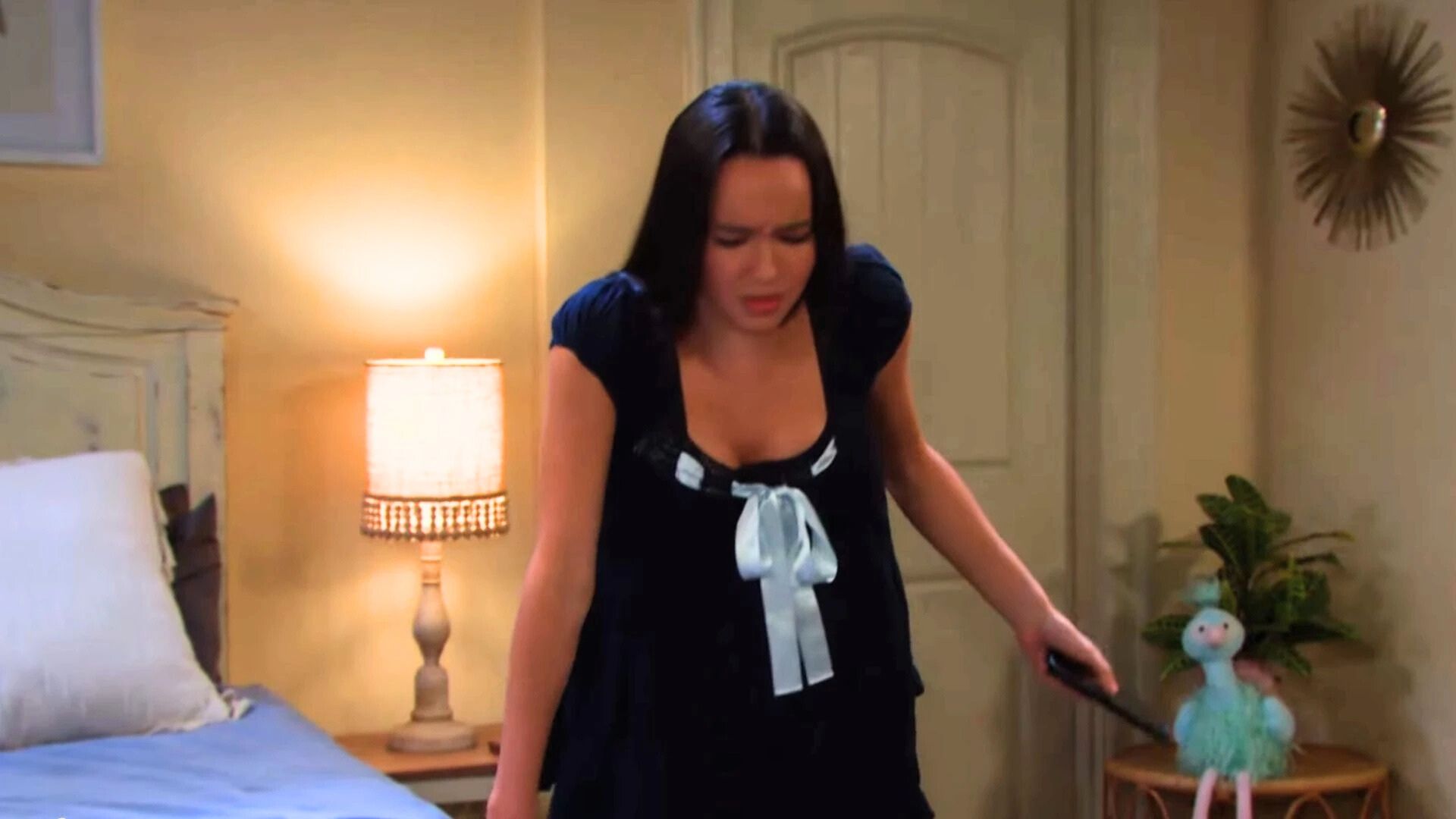 Sophia clutches her belly as she goes into labor on Days of our Lives | Image: Peacock