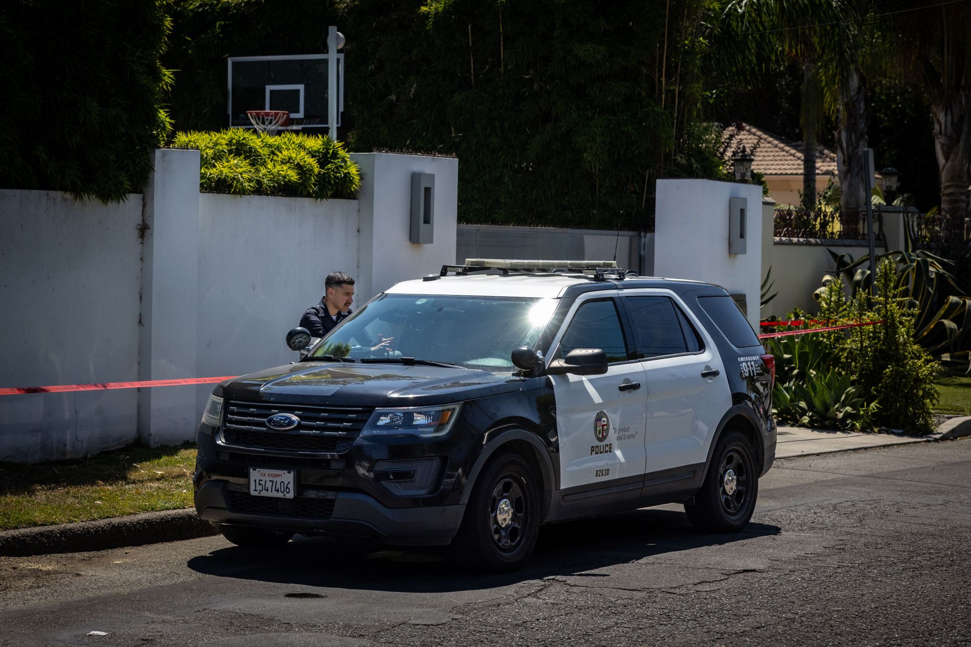 Los Angeles Police Department officials secure the home where Robin Kaye an &quot;American Idol&quot; music supervisor and her husband Thomas Deluca were found killed with gunshot wounds to the head... - Source: Getty