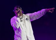 Nelly in concert (Image via Getty)