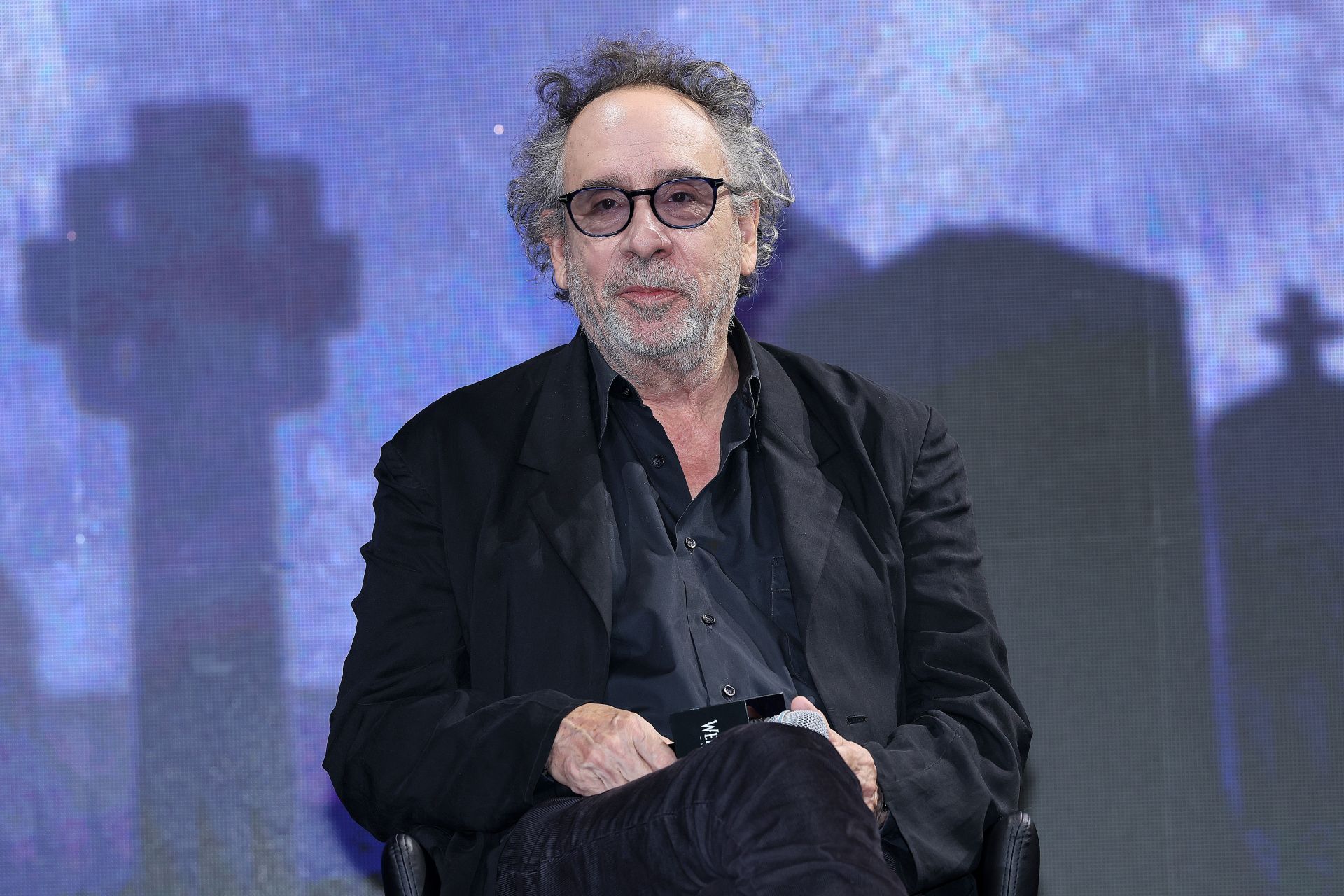 Director Tim Burton attends the &quot;Wednesday&quot; Season 2 press conference at Four Seasons Hotel on August 11, 2025 in Seoul, South Korea | Image via: Getty