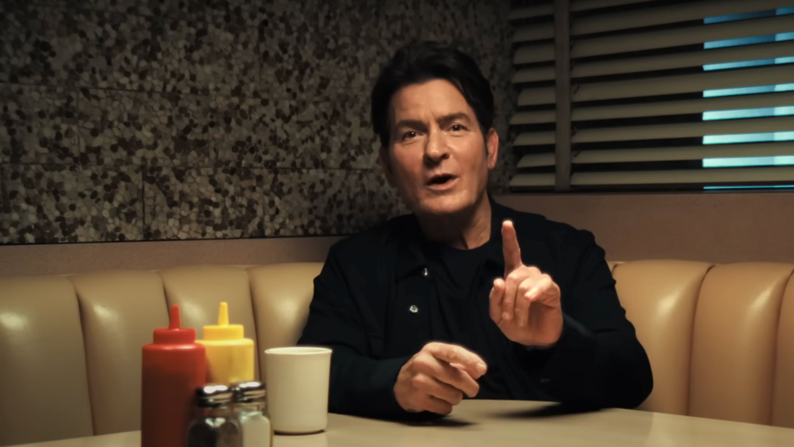 A still from &lsquo;aka Charlie Sheen,&rsquo; a two-part Netflix documentary (Images via YouTube/Netflix)