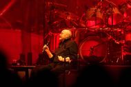 Phil Collins performing with Genesis In Concert - New York, NY - Image via Getty.