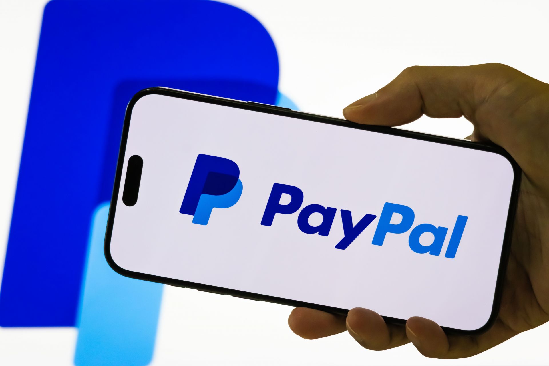 PayPal Holdings Inc. logo displayed on smartphone screen - Source: Getty
