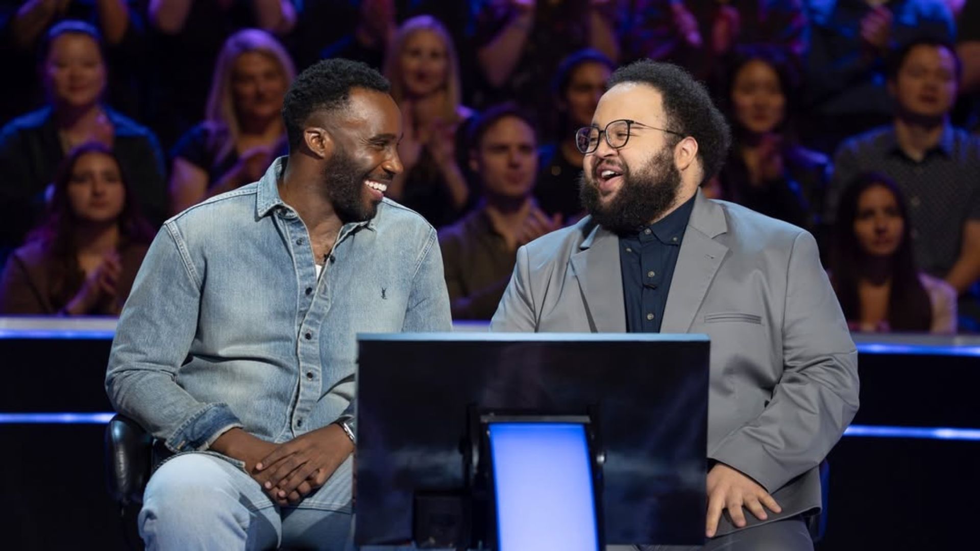 Tramell Tillman and Zack Cherry on Who Wants to Be a Millionaire | Image via Instagram/ @millionairetv