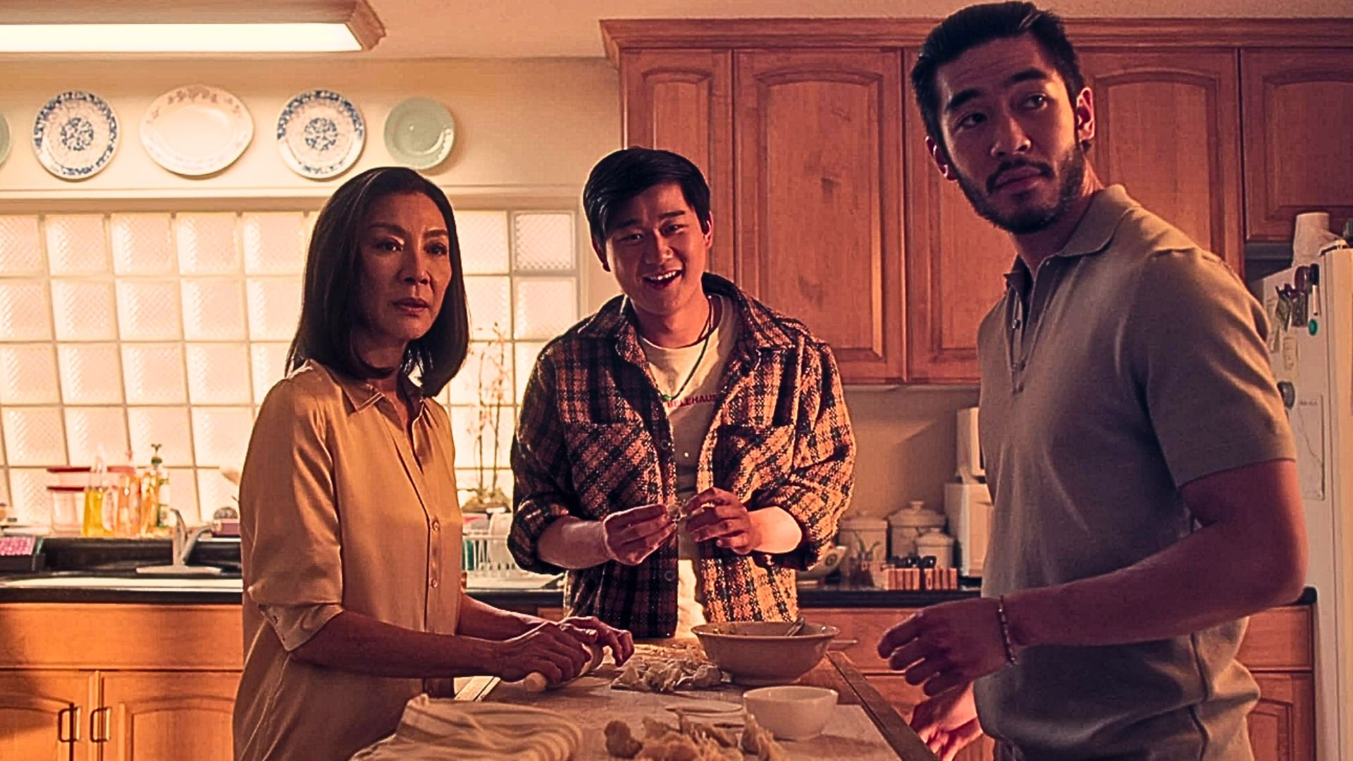 Michelle Yeoh, Sam Song Li, and Justin Chien in The Brothers Sun (Image via Netflix)