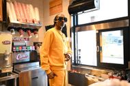 Snoop Dogg Works Surprise "Shift" at Raising Cane's in Vegas Ahead of National Chicken Finger Day on July 27 - Source: Getty
