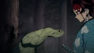 Tanjiro prays after for demons after killing them (Image Source: Studio Ufotable)