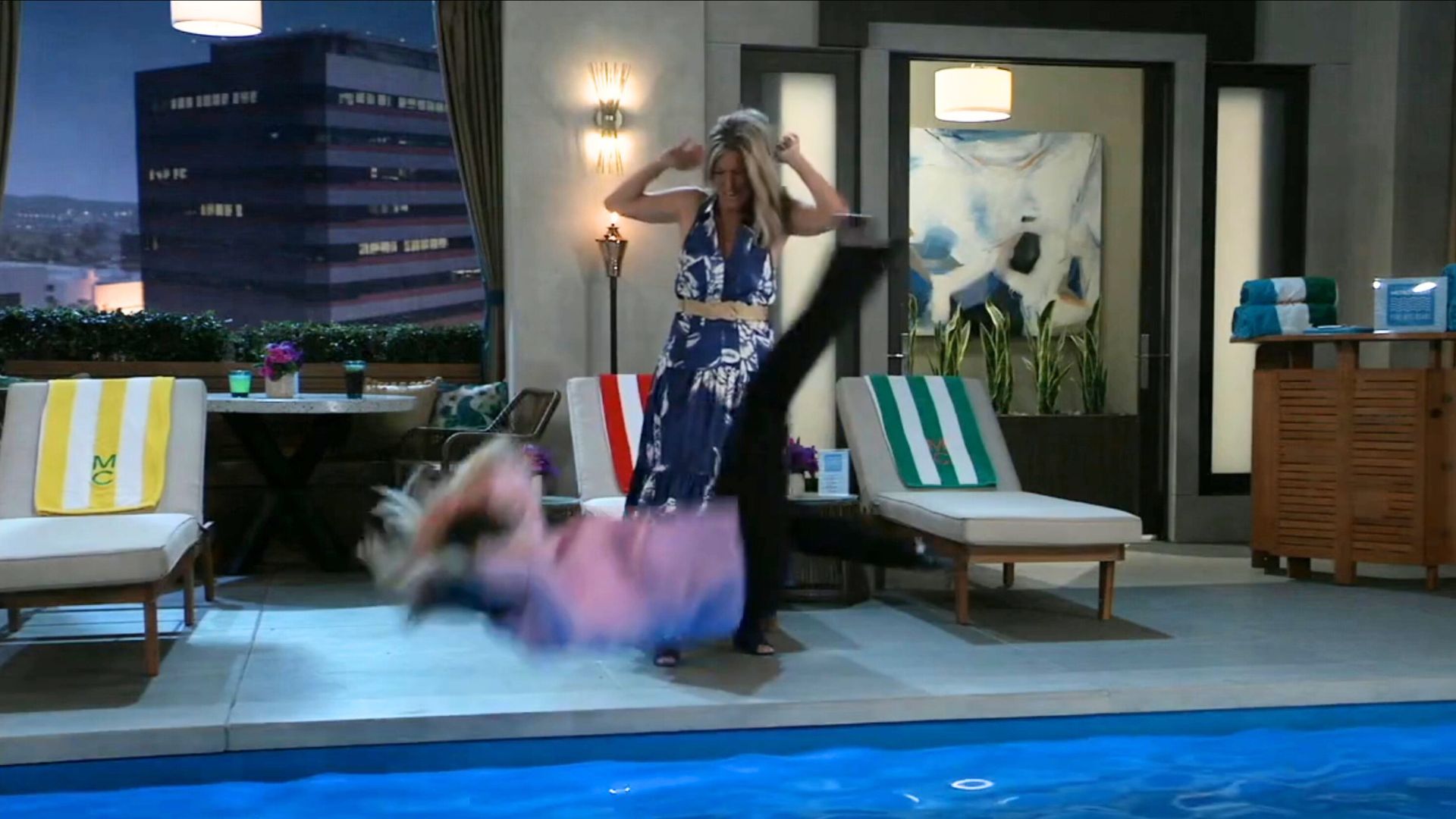 Nina (Cynthia Watros) ended up all wet after she and Carly (Laura Wright) argued on General Hospital | Image: ABC