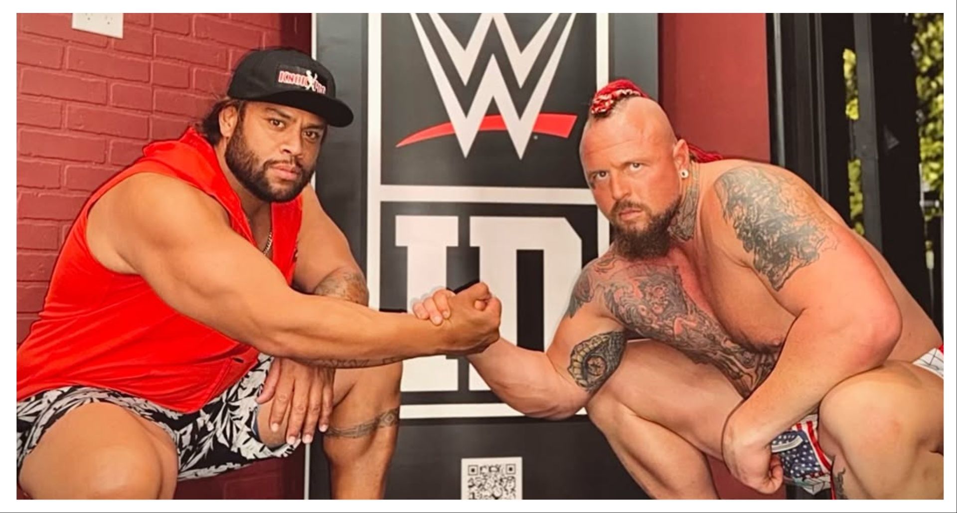 Viral pink hair guy, recognized as wrester Douglas Malo (right) challenges Rampage. (Image via Instagram/ theepicguy)