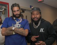 DJ Akademiks claims streamer Adin Ross is being subpoenaed by ROC Nation. (Image via Getty)