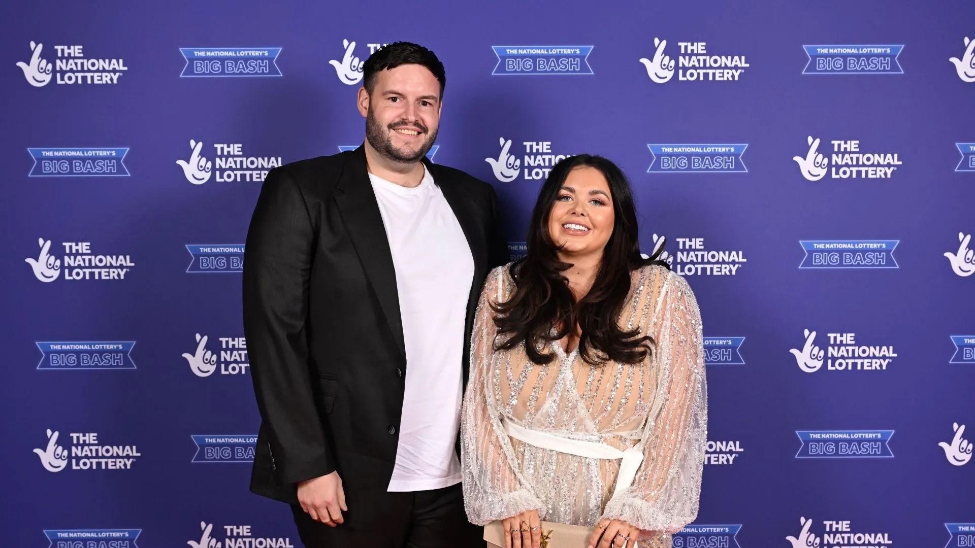 Scott Dobinson and Scarlett Moffatt attend The National Lottery