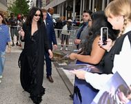 Catherine Zeta-Jones signs autographs outside the Wednesday S2 NY Fan Screening at Paris Theater on August 05, 2025 in New York City | Image via: Getty