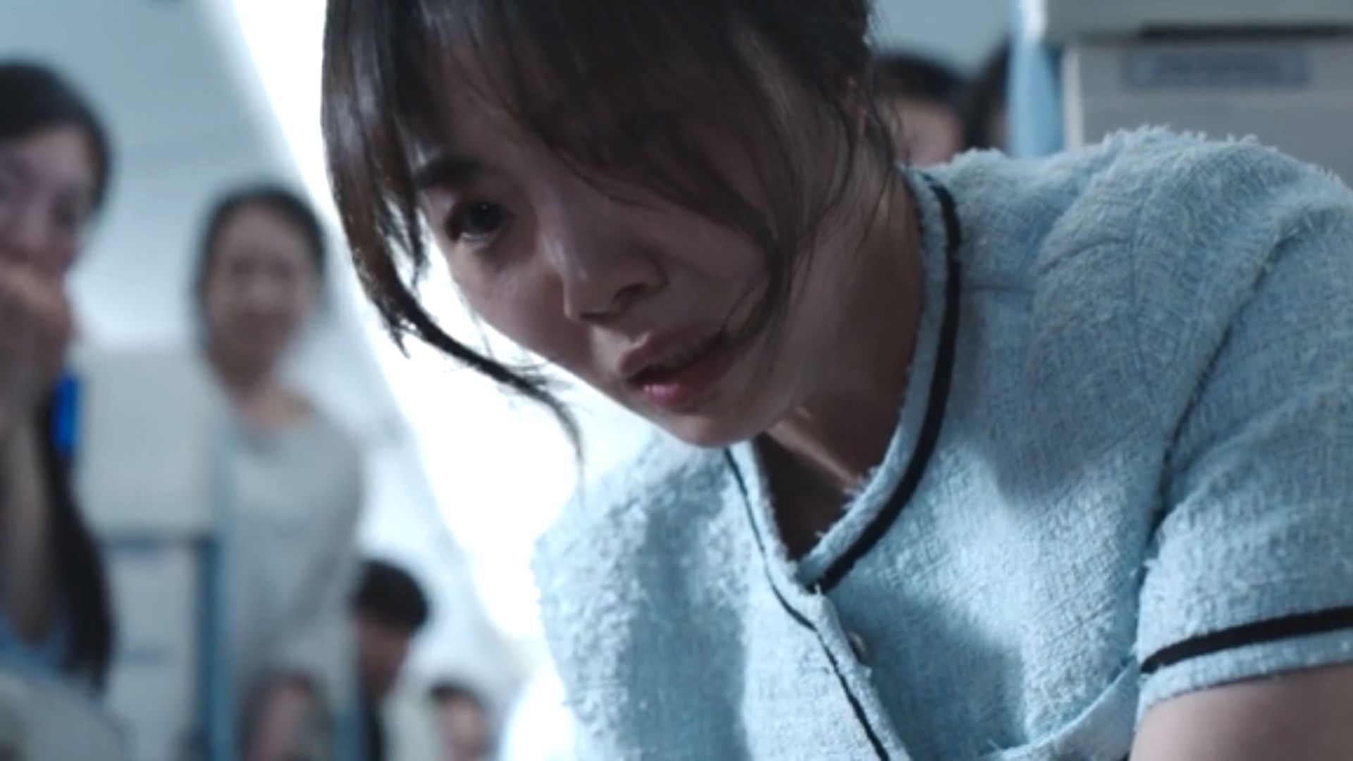 Dr. Choi on the plane (Image via Netflix)