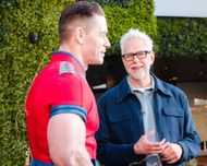Actor John Cena and Director James Gunn attend the HBO Max presents Peacemaker, From DC Studios VIP PEACEFEST at Nova SD on July 26, 2025 in San Diego, California. | Image via: Getty
