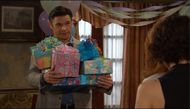 Xander (Paul Telfer) showered his birthday girl with presents. \Image: Peacock