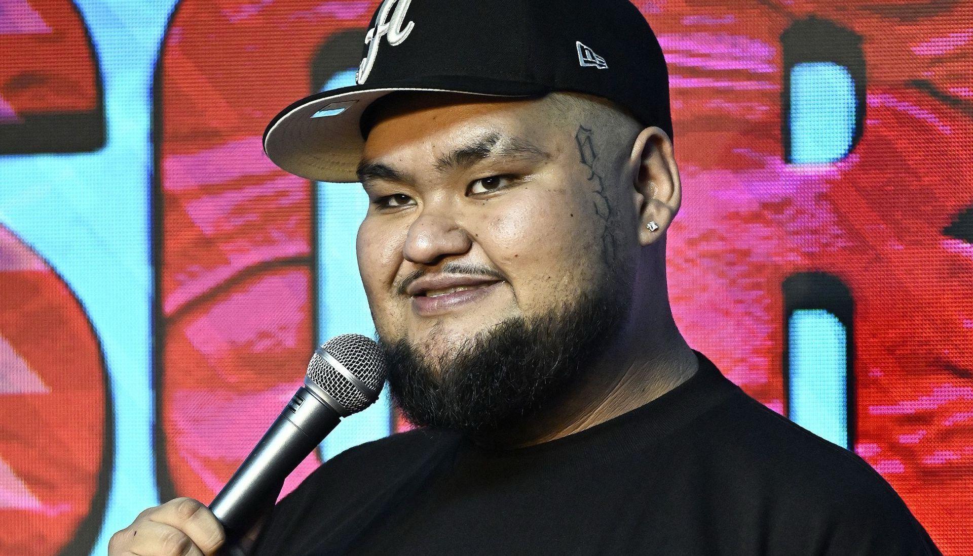 Ken Flores performs at The Ice House Comedy Club in Pasadena, California. (Image via Getty/Michael S. Schwartz)