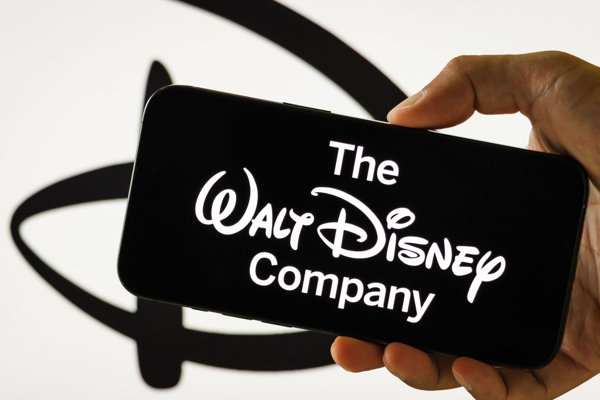 The Walt Disney Company logo displayed on smartphone screen - Source: Getty
