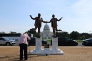 Statue Of Donald Trump And Jeffrey Epstein Holding Hands Appears On the National Mall (Image via Getty)