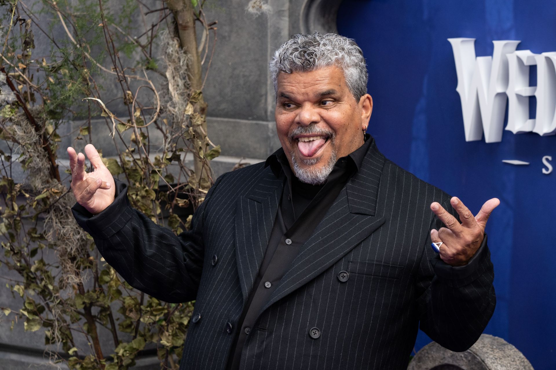 &quot;Luis Guzm&aacute;n attends the &quot;Wednesday&quot; Season 2, Part 1 Global Premiere in London | Image via: Getty