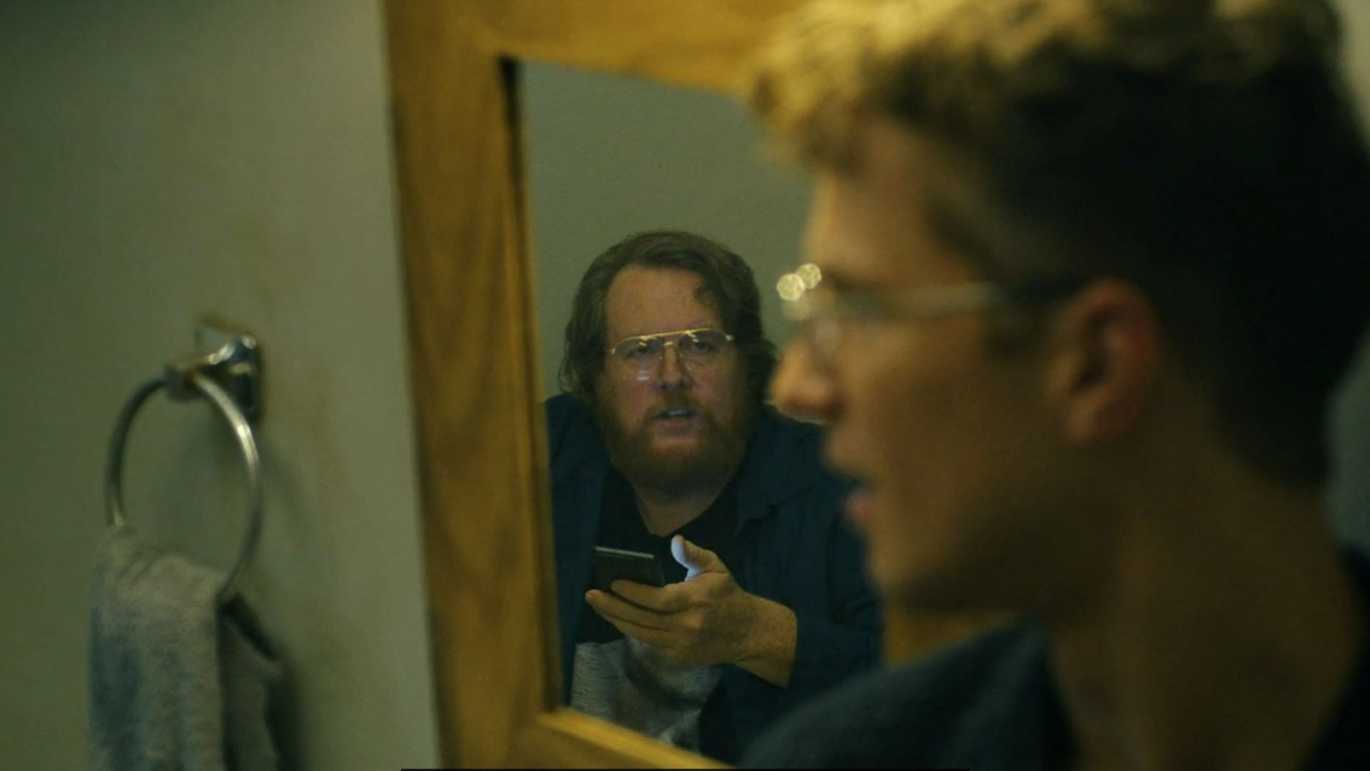 John Economos quizing Adrian on spiders. (Image Via: HBO Max)