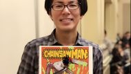 Tatsuki Fujimoto with the Chainsaw Man illustrations (Image Credits: Entertainmentabc)