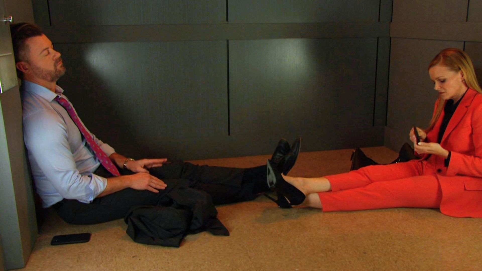 Belle and EJ were stuck in an elevator in Days of our Lives | Image: Peacock