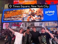 William Lipton and co-stars with their billboard in Times Square | Instagram/William Lipton