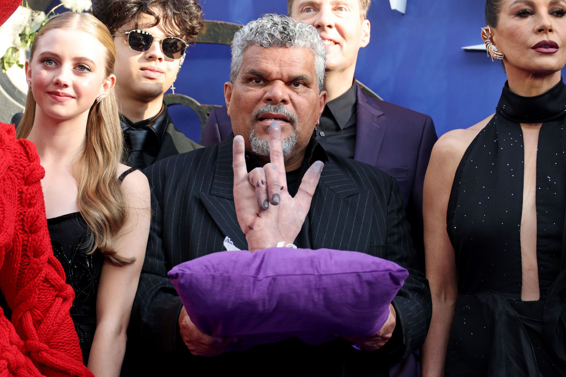 Evie Templeton, Isaac Ordonez, Luis Guzm&aacute;n, Screenwriter Miles Millar and Catherine Zeta-Jones attend the &quot;Wednesday&quot; Season 2, Part 1 premiere in London | Image via: Getty