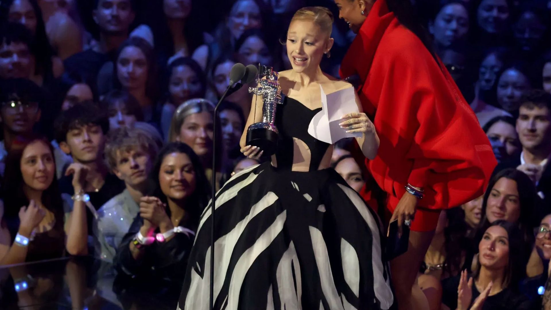 Ariana Grande accepting the VMAs for 