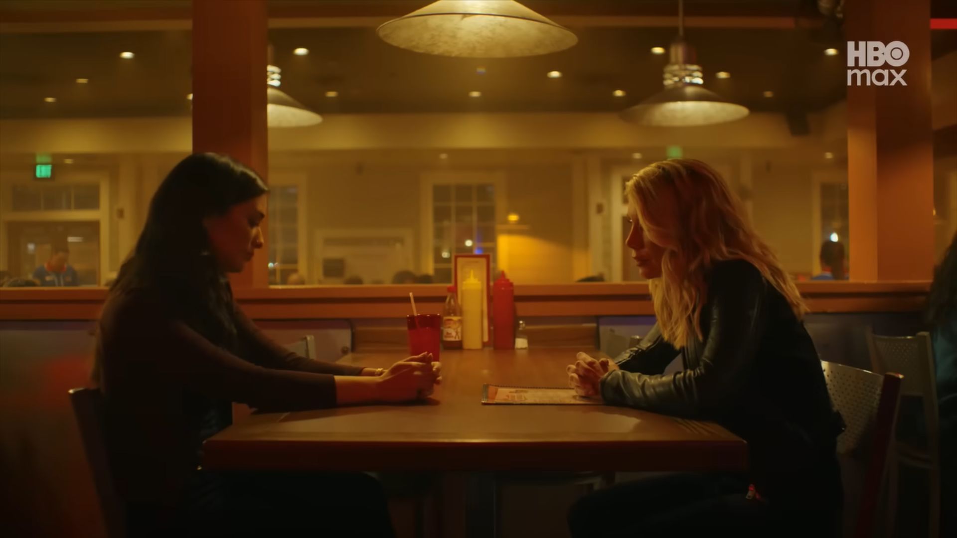 Emilia and Sasha inside the Big Belly Burger in Peacemaker Season 2 Episode 8 | Image Via: HBO Max