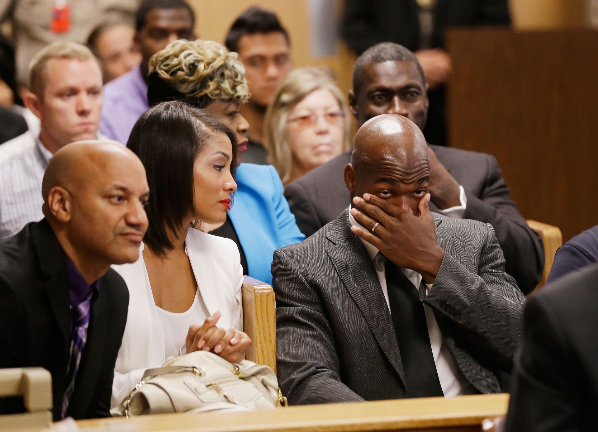 Adrian Peterson and Ashley Brown at Peterson&#039;s child abuse case hearing in 2014 (Image via Getty)