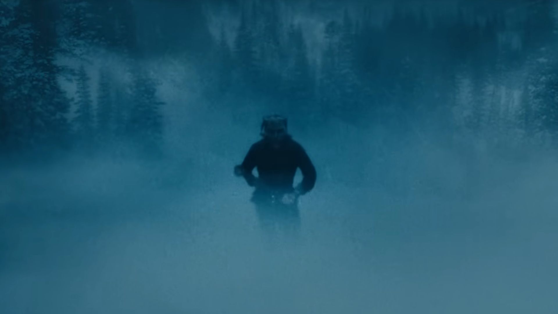 The Grabber (Ethan Hawke) is skating down on ice with a weapon in his hand