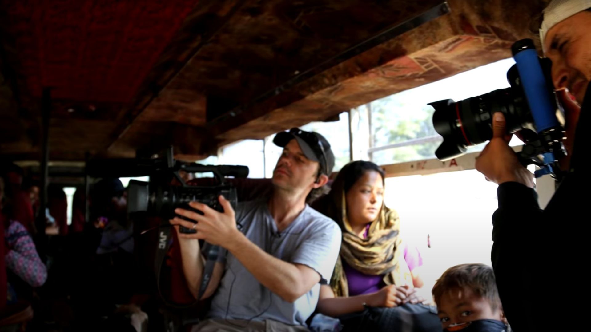 A still from Armed Only With A Camera: The Life and Death of Brent Renaud. (Image via HBO Max)