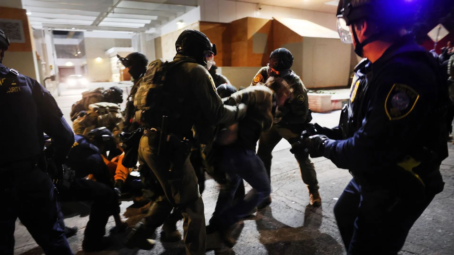 ICE agents arresting protestors in Portland, Oregon (Image via Getty)