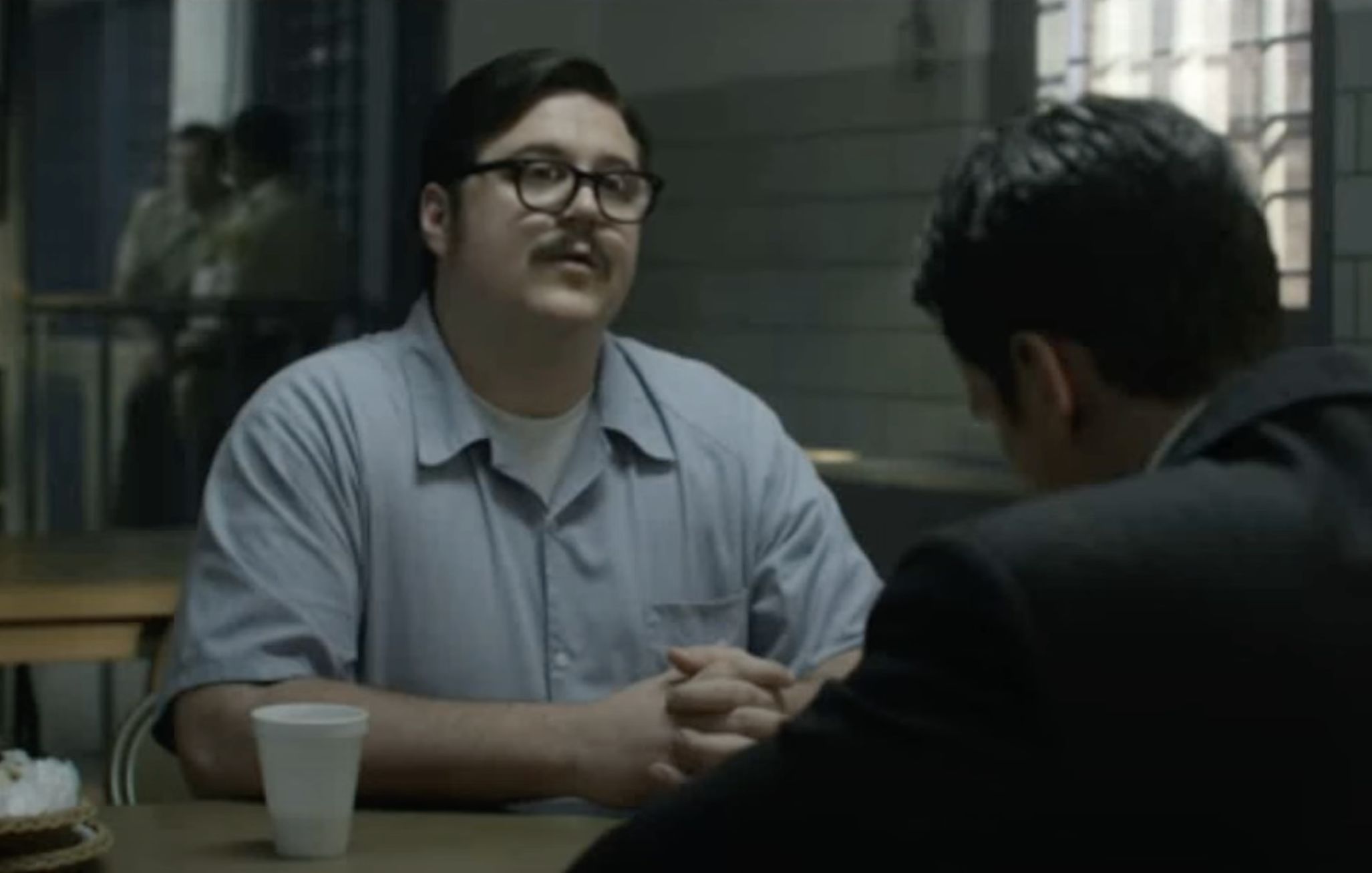 Bill and Holden receive a new case from Detective Ocasek in Mindhunter episode 4 (Image Via Netflix)